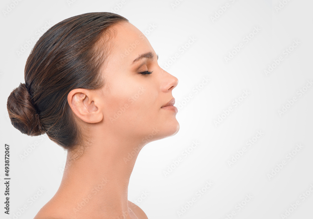 Perfecting perfection. Studio beauty shot of an attractive brunette woman. Perfecting perfection. Studio beauty shot of an attractive brunette woman.