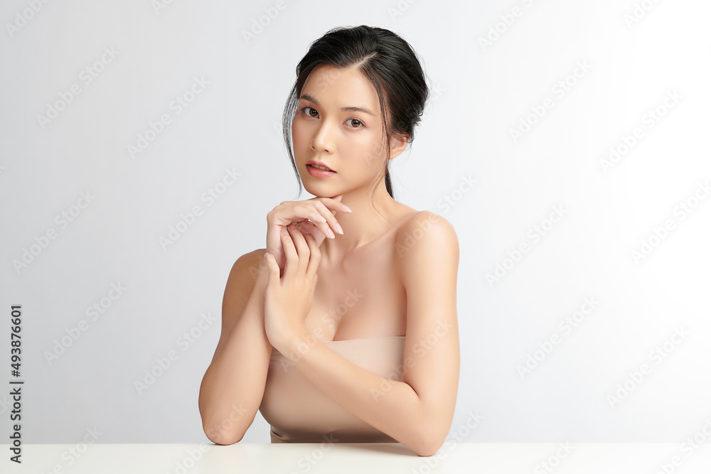 Beautiful young asian woman with clean fresh skin on white background, Face care, Facial treatment, Cosmetology, beauty and spa, Asian women portrait. Beautiful young asian woman with clean fresh skin on white background, Face care, Facial treatment, Cosmetology, beauty and spa, Asian women portrait.