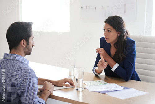 What distinguishes you from all the other candidates. Shot of a businesswoman interviewing a job applicant in an office.