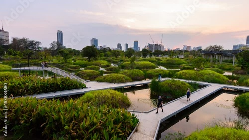 view of Benchakitti Park in evening time