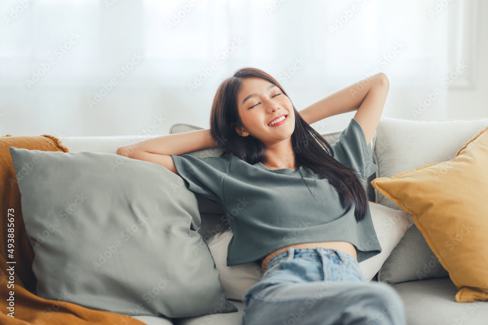 Home Comfort. Young Asian Lady Relaxing on Cozy Sofa in Living Room Stock  Photo - Image of japanese, leisure: 197666588