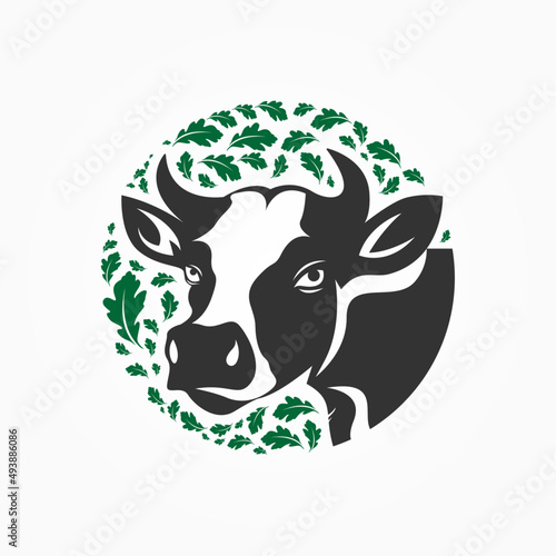 Dairy fam, black and white cow, O letter 