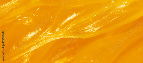 Juicy orange pulp as a background.