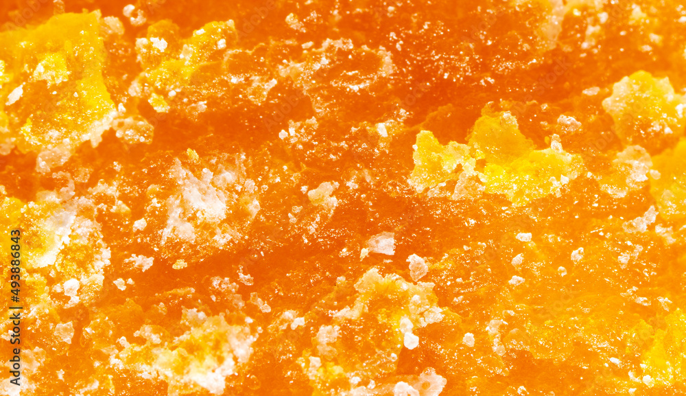 Dried yellow mango pulp as background. Dried yellow mango pulp as background.