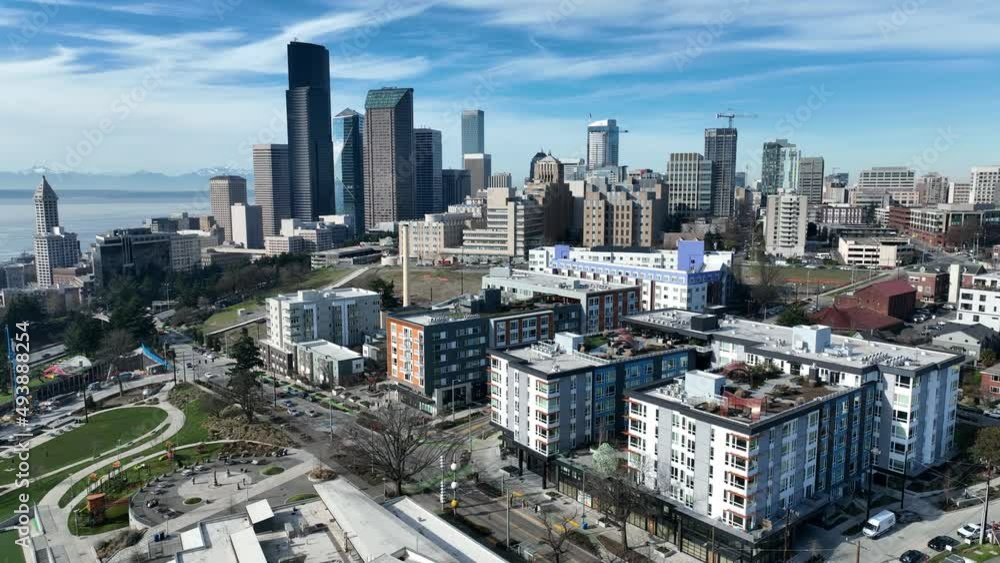 Cinematic 4K aerial drone rise and reverse shot of First Hill, Yesler Terrace, Atlantic, Cherry Hill, Squire Park, skyscrapers and high-rise buildings downtown Seattle, Washington Cinematic 4K aerial drone rise and reverse shot of First Hill, Yesler Terrace, Atlantic, Cherry Hill, Squire Park, skyscrapers and high-rise buildings downtown Seattle, Washington