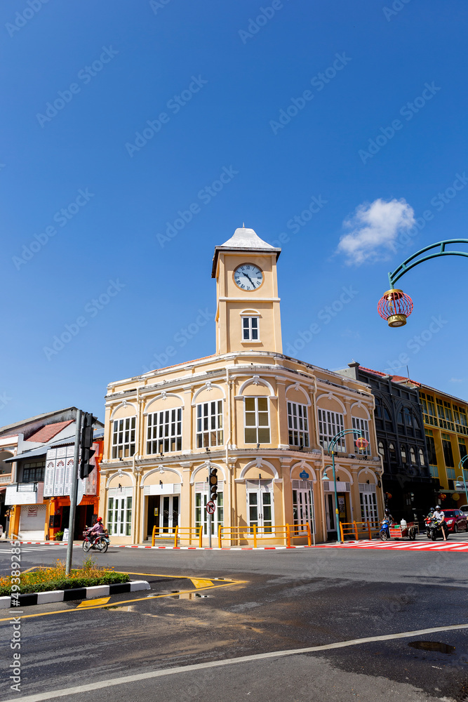 Clock tower from across street in Phuket old town, Thailand tourist attraction, building and architecture