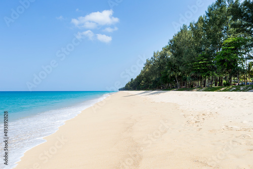 Beautiful fine sand beach with blue sea in Khao lak, Phangnga Thailand, tropical beach, summer outdoor day light, holiday destination in Asia