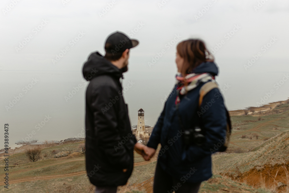 Man and woman are holding hands. Pendulum