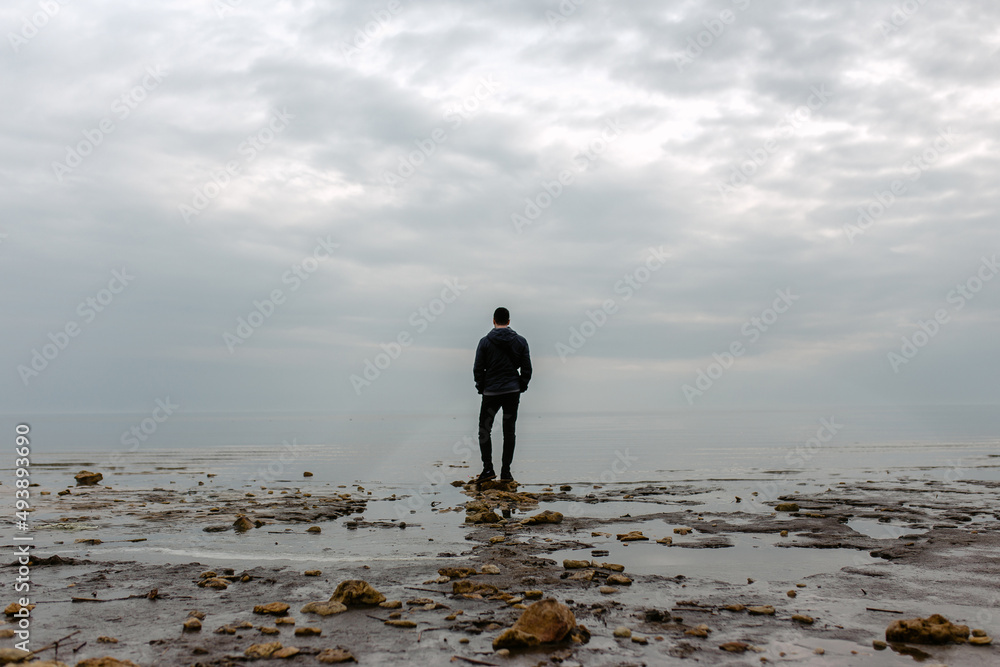 Naklejka premium man on the water