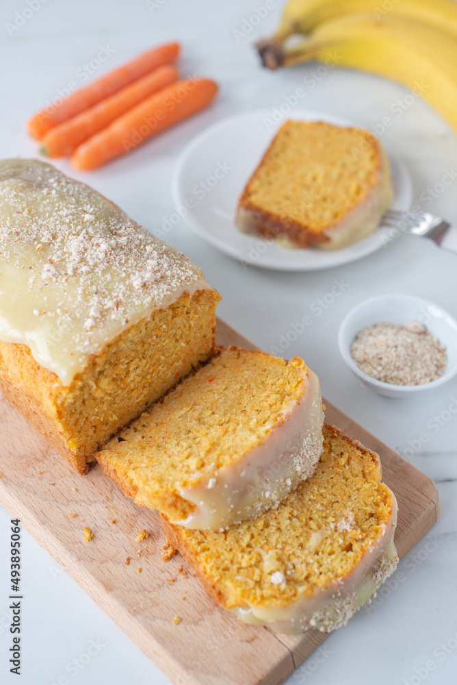 Sweet pumpkin carrot cake with icing yoghurt cream