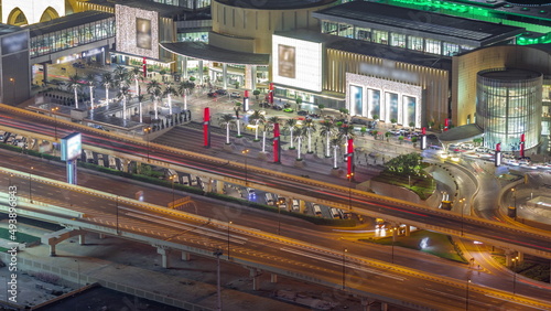 Canvas Print Dubai downtown night timelapse and highway road traffic near shopping mall entra