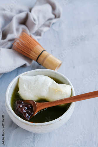 Delicious homemade dessert. Matcha Zenzai with Yakimochi. Great snack for family and friends gatherings photo