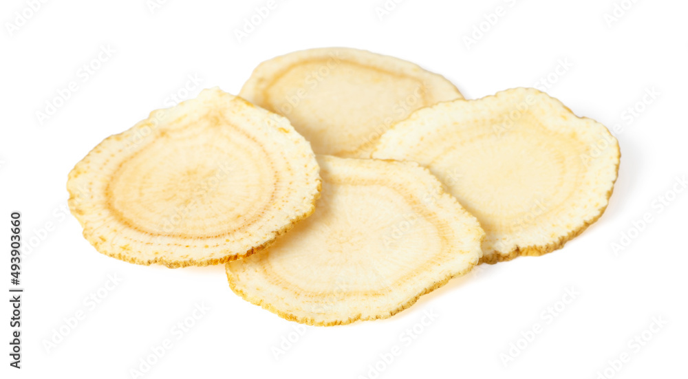Close up of ginseng slices isolated on white background. Close up of ginseng slices isolated on white background.