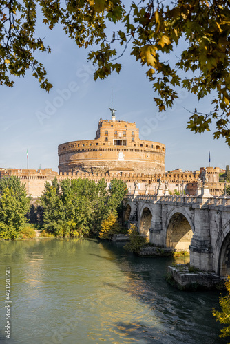 Landscape of Tiber river and Castle of the Holy Angel in Rome on sunny autumn day. Traveling Italy concept. Idea of visiting famous italian landmarks