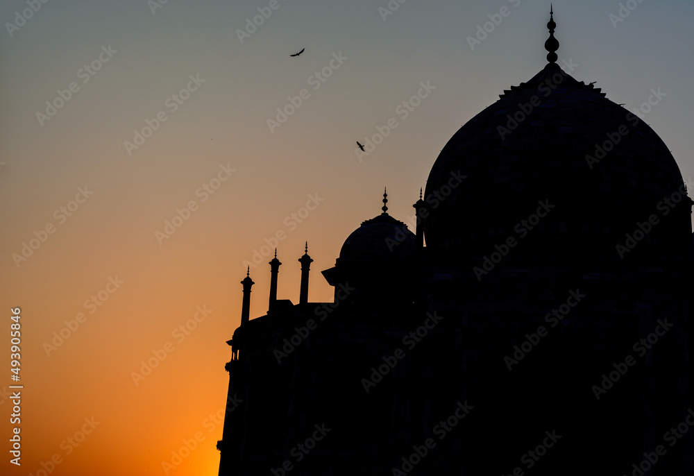 Silhouette of Taj Mahal. The Taj Mahal is the epitome of Mughal art and one of the most famous buildings in the world, it is an UNESCO world heritage site.