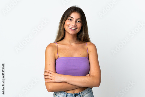 Young caucasian woman isolated  on white background keeping the arms crossed in frontal position
