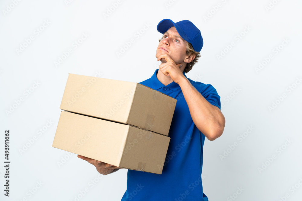 Delivery man over isolated white background having doubts Delivery man over isolated white background having doubts