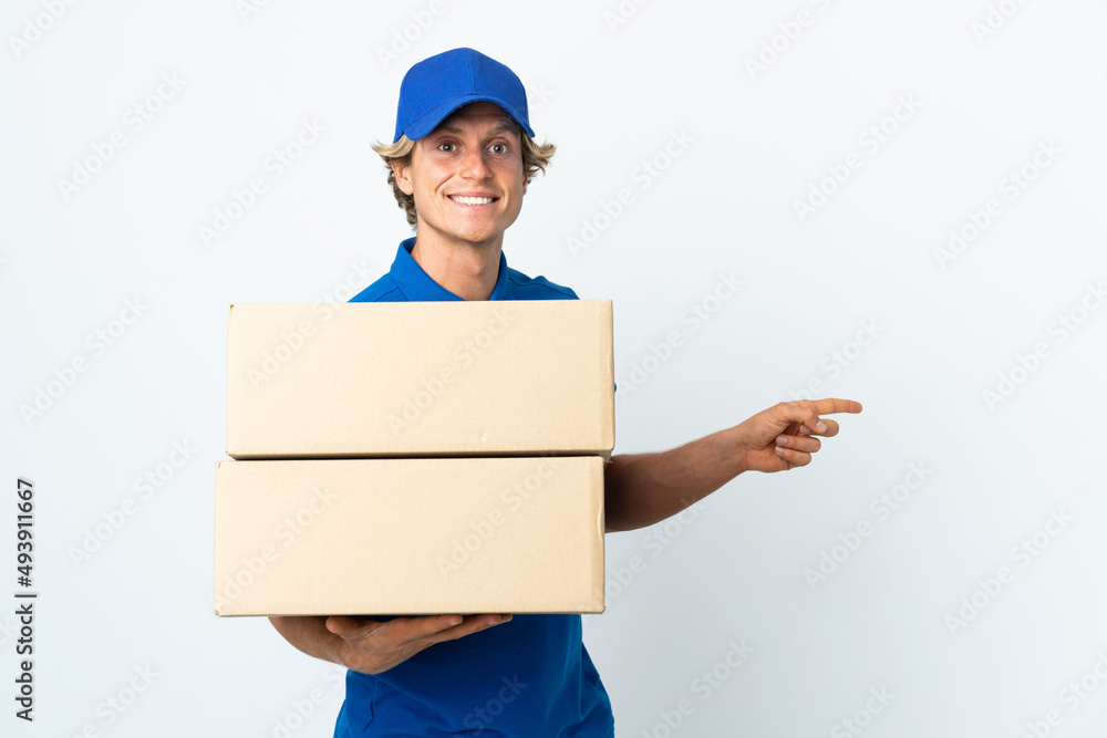 Delivery man over isolated white background pointing finger to the side Delivery man over isolated white background pointing finger to the side