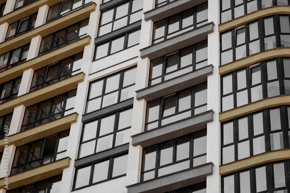 windows of a residential apartment building windows of a residential apartment building