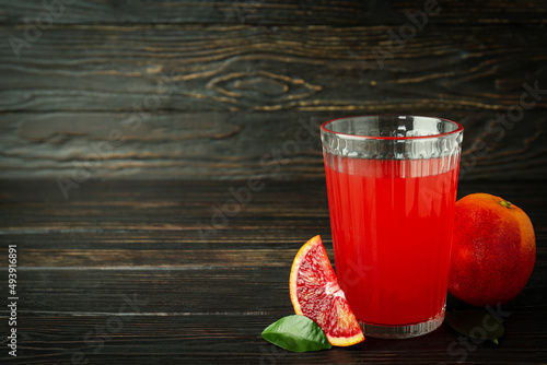 Concept of fresh drink with red orange juice