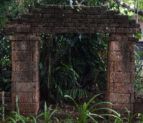 Old style brick gateway in the jungle