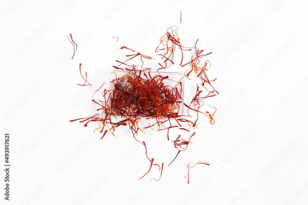Fototapeta premium Saffron on white background, kesar, crocus, saffron background, pile of saffron