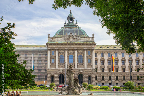 Germany, Bavaria, Munich, Neptunbrunnen in front of Palace of Justice photo