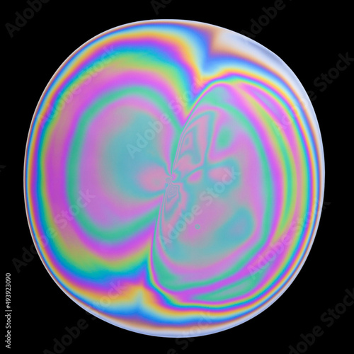 Canvas-taulu Abstract iridescent oil slick on water isolated on black background