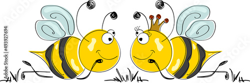 Cute couple of bees lying in the garden.
