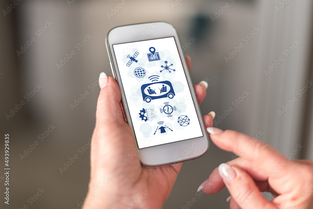 Self-driving car concept on a smartphone Self-driving car concept on a smartphone