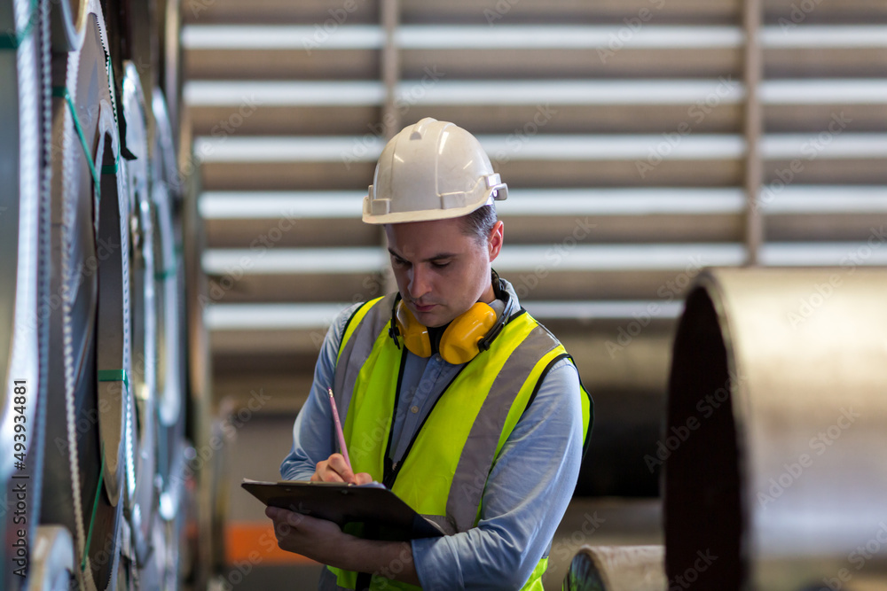 Foreman or worker work at factory site check up machine or products in site. Engineer or Technician checking Material or Machine on Plant. Industrial and Factory. Foreman or worker work at factory site check up machine or products in site. Engineer or Technician checking Material or Machine on Plant. Industrial and Factory.
