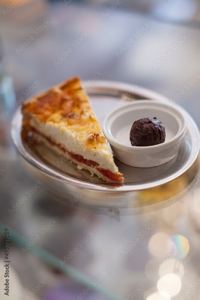 Pie served with a ball of chocolate Pie served with a ball of chocolate