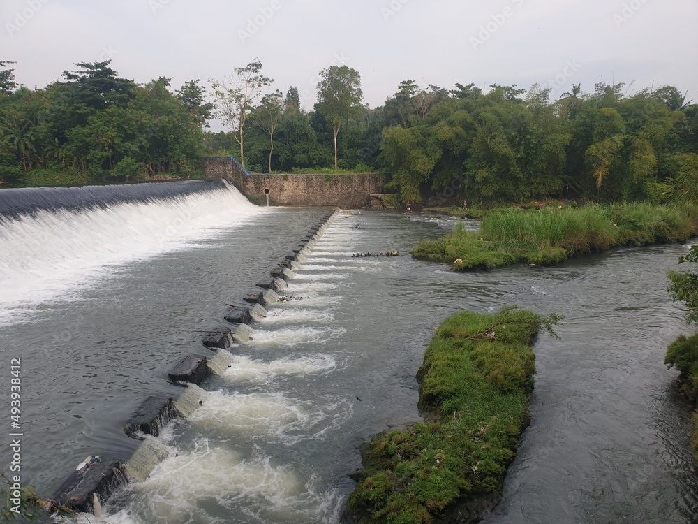 The dam with the Yogyakarta river flows fast