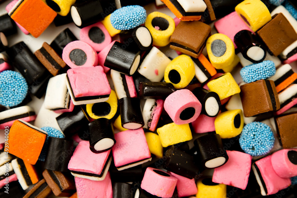 Sweet gummies, licorice gums, candies for kids and grownups . Stock 写真 Adobe Stock
