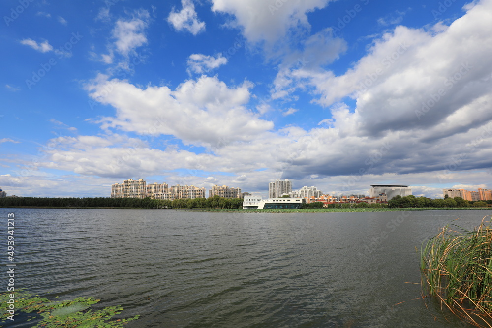 Sunny waterfront urban architectural scenery, North China Sunny waterfront urban architectural scenery, North China