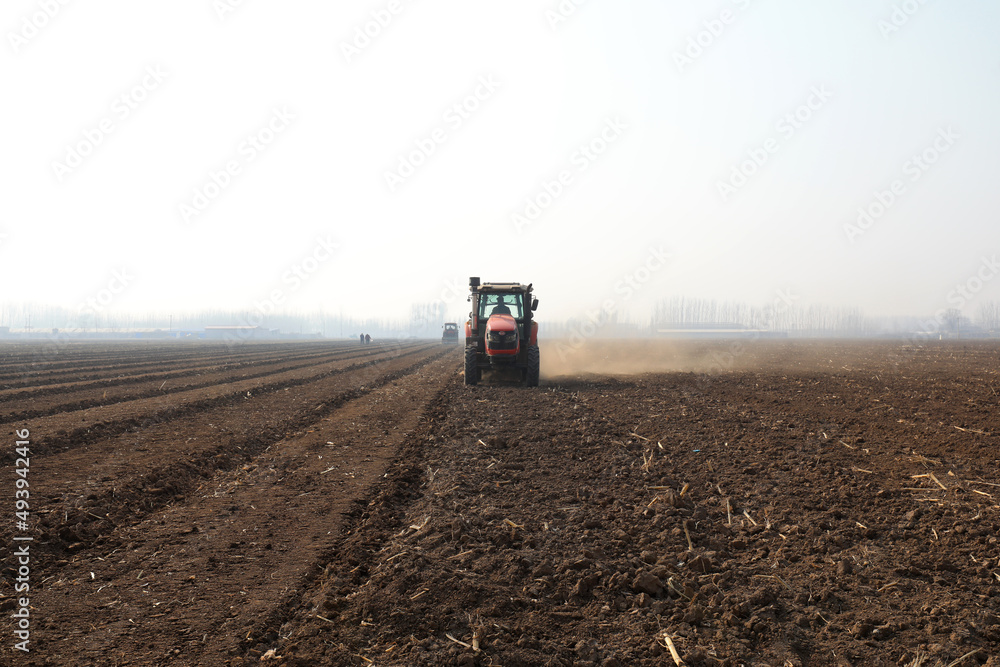 Farmers drive planters to plant peas in the fields, North China Farmers drive planters to plant peas in the fields, North China