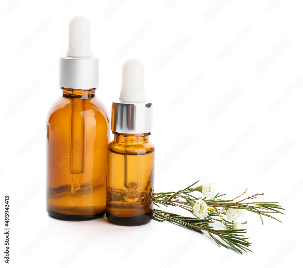 Bottles of natural essential oil on white background Bottles of natural essential oil on white background