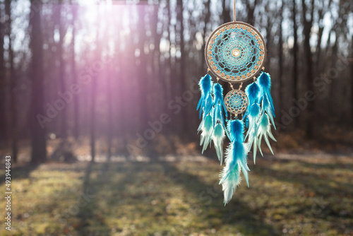 Handmade dream catcher with feathers threads and beads rope hanging