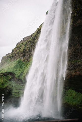 Seljalandsfoss stream of water dropping down into it s own pool. Iceland  waterfall