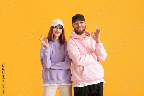 Cool young couple in hoodie...
