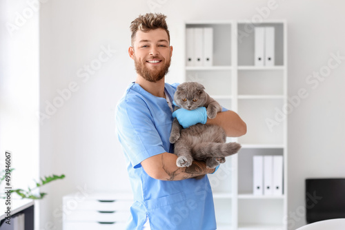 Male veterinarian with Scot...