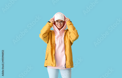 Beautiful young woman in st...
