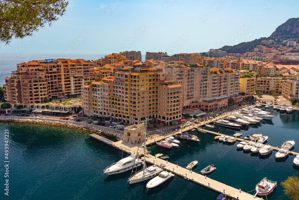 Obraz na płótnie Panoramic aerial view of Fontvieille - district of Monaco-Ville.Luxury yacht moored in the bay of Monaco, France . Principality of Monaco is a sovereign city state, located on the French Riviera  w salonie