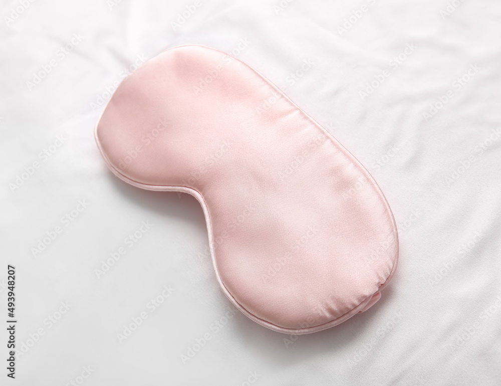 Sleep mask on light fabric background Sleep mask on light fabric background