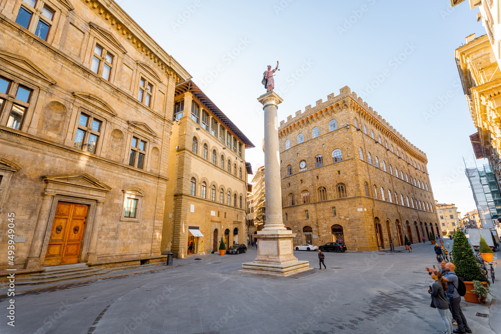 Fototapeta premium Morning view on Piazza Santa Trinita, triangular square, in Florence city. Travel italian cities of Tuscany. Italian Renaissance architecture