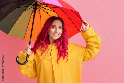 Beautiful woman in raincoat...