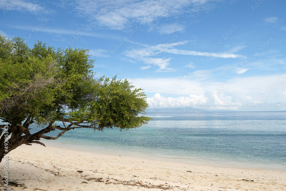 Beautiful view of Cristo Rei Backside Beach or known as Dolok Oan Beach in Dili, Timor Leste. Tropical beach background. Beautiful view of Cristo Rei Backside Beach or known as Dolok Oan Beach in Dili, Timor Leste. Tropical beach background.