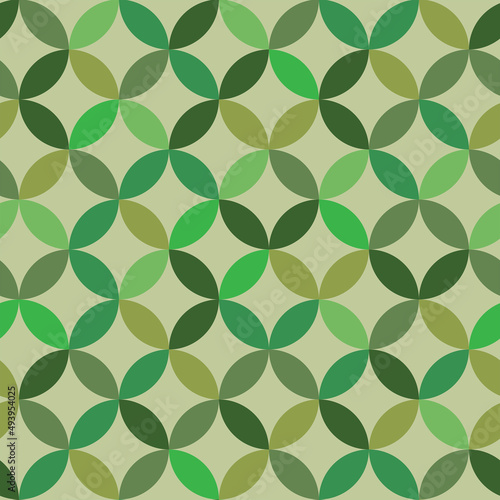 Mid century modern geometric leaf seamless pattern in different shades of green. Great for textile, home décor and wallpaper. 