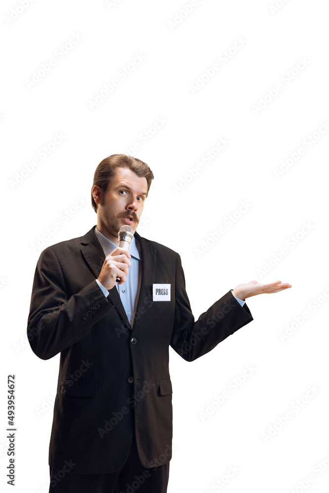 Emotive young man, professional sport commentator, journalist with microphone broadcasting football match isolated over white background. Sport, news concept Emotive young man, professional sport commentator, journalist with microphone broadcasting football match isolated over white background. Sport, news concept