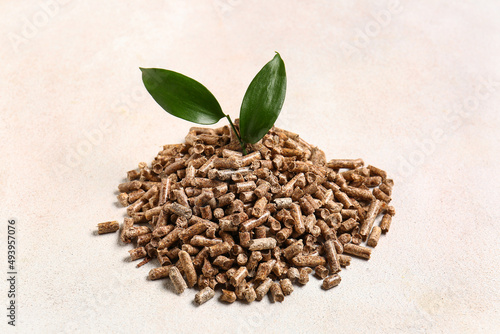 Pile of wood pellets on lig...
